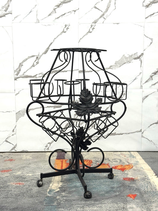 PORTABOTTIGLIE SCULTOREO NELLO STILE DI MARCEL DUCHAMP IN FERRO BATTUTO